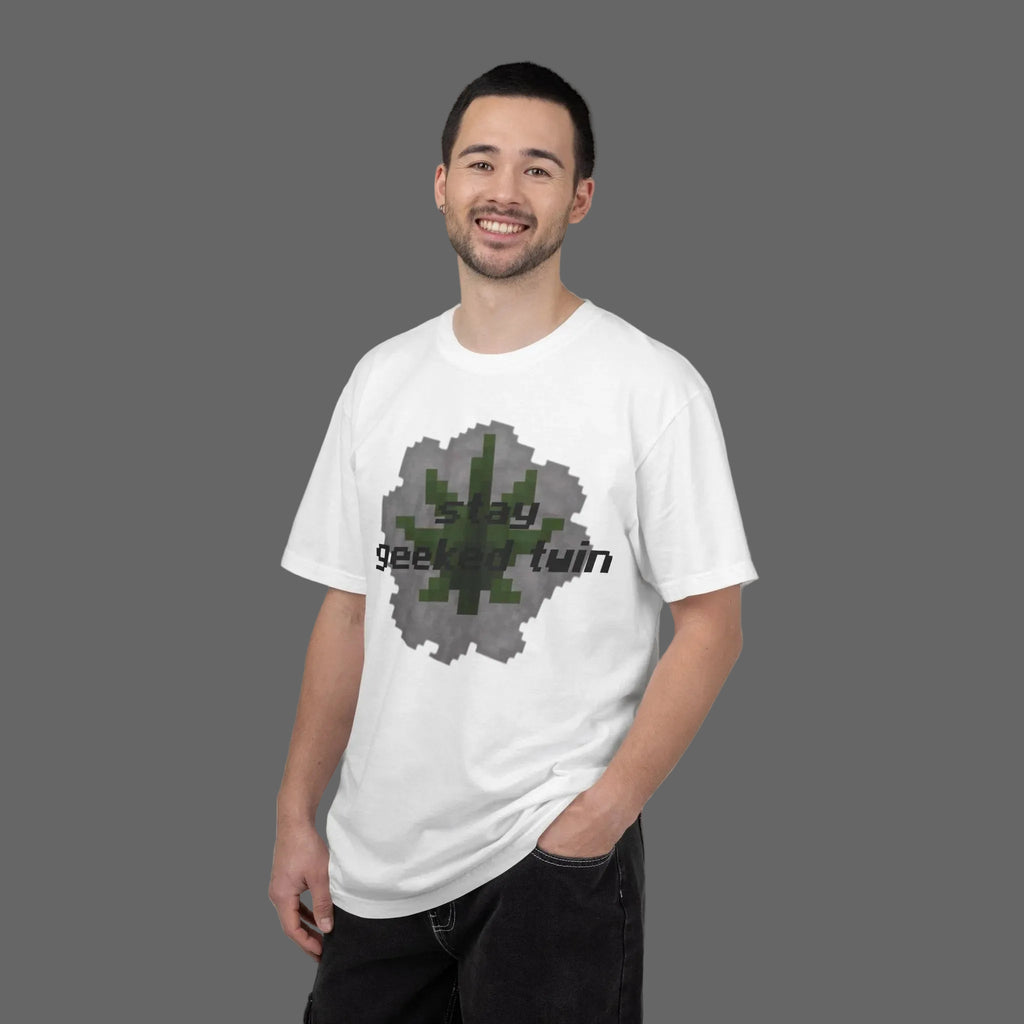 Man wearing a white t-shirt with 'stay geeked twin' text on a white background